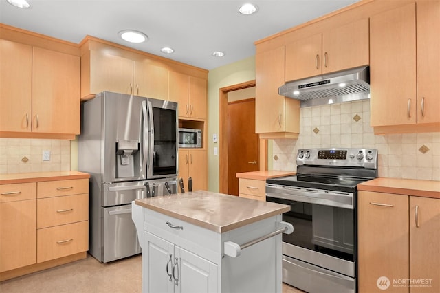 507 Lyla Ln, Bellingham, WA 98225 - kitchen featuring stainless steel appliances, ventilation hood, light brown cabinets, light countertops, and backsplash