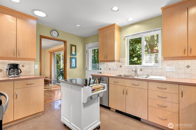 507 Lyla Ln, Bellingham, WA 98225 - kitchen with light brown cabinetry, decorative backsplash, light countertops, stainless steel dishwasher, and recessed lighting