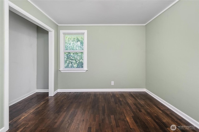 10812 2nd Ave S, Seattle, WA 98168 - unfurnished bedroom with ornamental molding, dark wood finished floors, and a closet