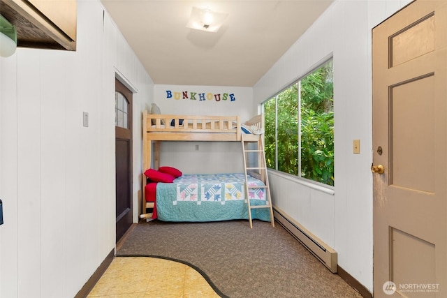 1321 E Mason Lake Dr E, Grapeview, WA 98546 - bedroom with a baseboard radiator and carpet flooring