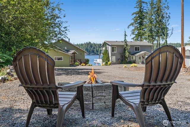 1321 E Mason Lake Dr E, Grapeview, WA 98546 - view of yard featuring an outdoor fire pit