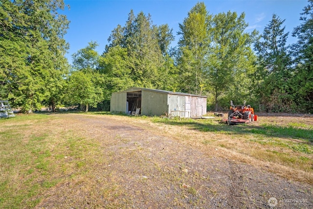 9330 Odell St, Blaine, WA 98230 - view of grassy yard with a pole building and an outdoor structure