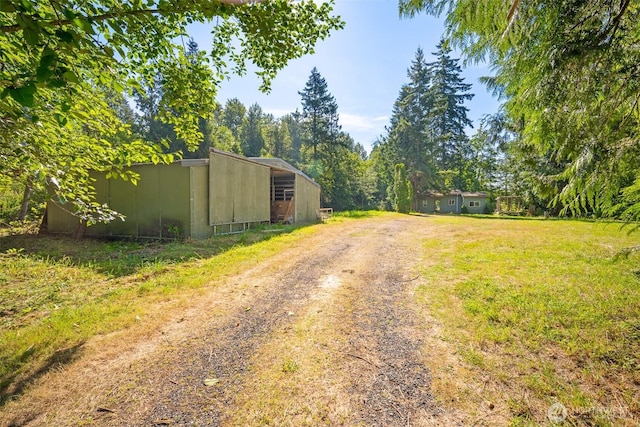9330 Odell St, Blaine, WA 98230 - view of dirt / gravel road with a pole building