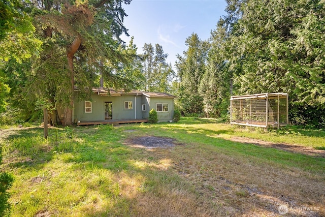 9330 Odell St, Blaine, WA 98230 - view of green lawn with a wooden deck