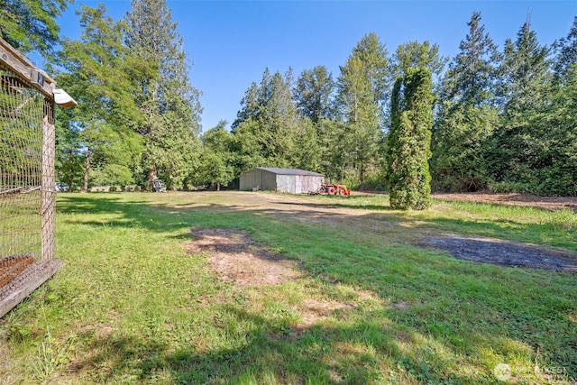 9330 Odell St, Blaine, WA 98230 - view of green lawn featuring an outbuilding