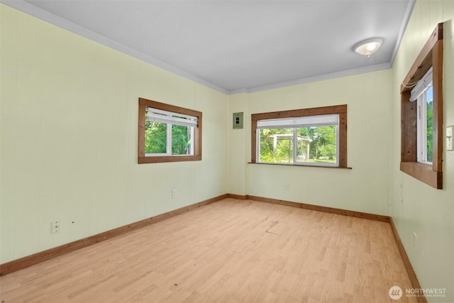 9330 Odell St, Blaine, WA 98230 - empty room with wood finished floors and ornamental molding