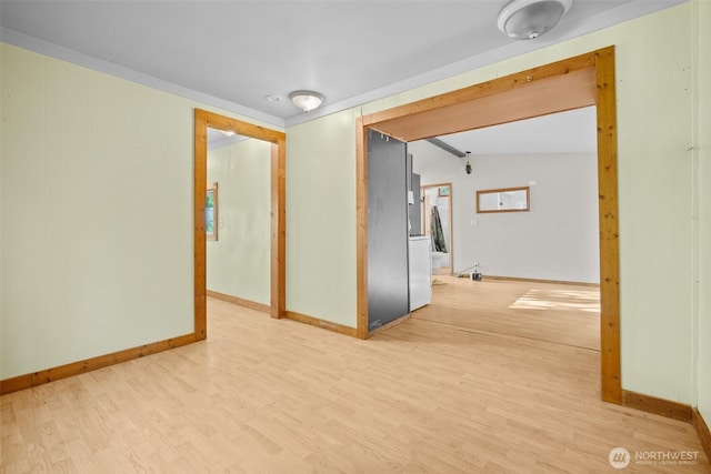 9330 Odell St, Blaine, WA 98230 - empty room with light wood-style flooring and vaulted ceiling