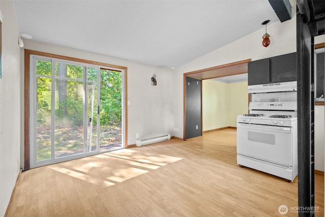 9330 Odell St, Blaine, WA 98230 - kitchen with white gas range, under cabinet range hood, baseboard heating, light wood finished floors, and vaulted ceiling