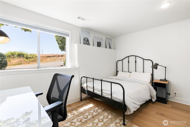 600 SW Cloverdale St, Seattle, WA 98106 - bedroom with wood finished floors and recessed lighting