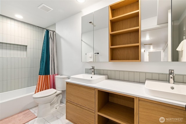 600 SW Cloverdale St, Seattle, WA 98106 - bathroom with double vanity, shower / bathtub combination with curtain, and tile patterned floors