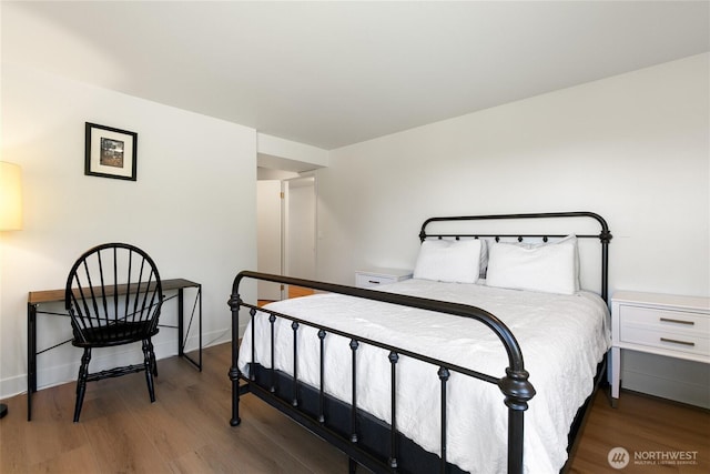 600 SW Cloverdale St, Seattle, WA 98106 - bedroom featuring wood finished floors
