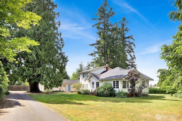 8597 Harborview Rd, Blaine, WA 98230 - view of front of property featuring a chimney and asphalt driveway