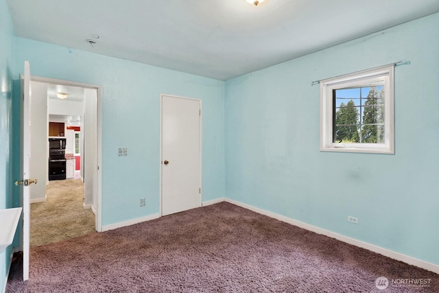 8597 Harborview Rd, Blaine, WA 98230 - unfurnished bedroom with carpet floors and baseboards