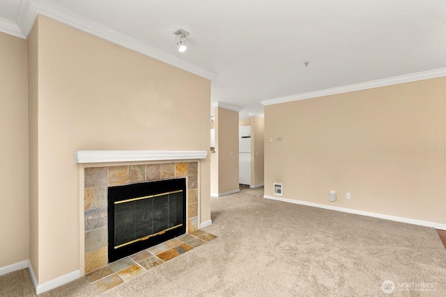 33020 10th Ave SW Unit 301, Federal Way, WA 98023 - unfurnished living room featuring crown molding, carpet, and a fireplace