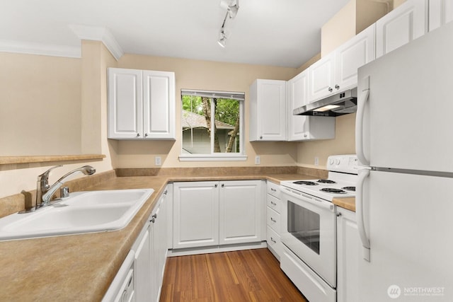 33020 10th Ave SW Unit 301, Federal Way, WA 98023 - kitchen featuring white appliances, under cabinet range hood, white cabinets, light countertops, and ornamental molding