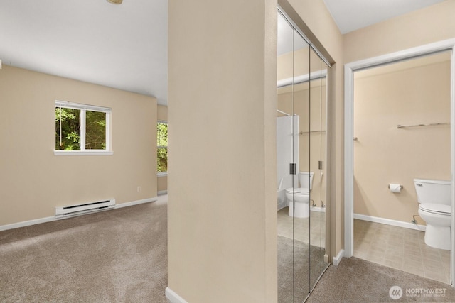 33020 10th Ave SW Unit 301, Federal Way, WA 98023 - hallway featuring a baseboard heating unit and carpet floors