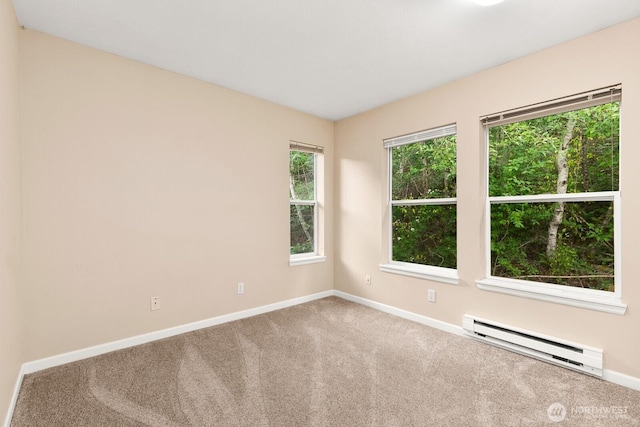 33020 10th Ave SW Unit 301, Federal Way, WA 98023 - spare room featuring baseboard heating and carpet flooring