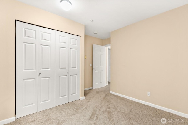 33020 10th Ave SW Unit 301, Federal Way, WA 98023 - unfurnished bedroom featuring carpet and a closet