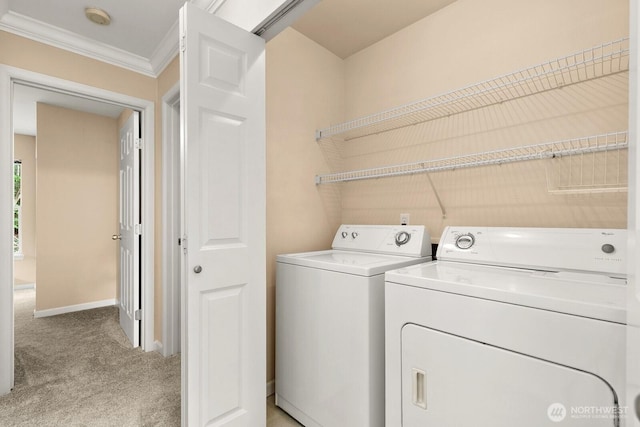 33020 10th Ave SW Unit 301, Federal Way, WA 98023 - washroom featuring independent washer and dryer, light carpet, and ornamental molding