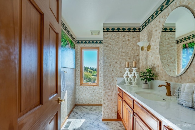 8705 Fenwick Loop SE, Olympia, WA 98513 - full bathroom with vanity, marble finish flooring, and wallpapered walls