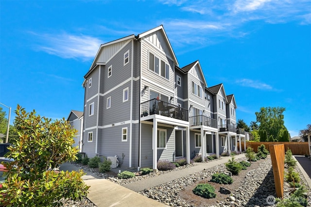 5690 Sunstone Pl Unit 101, Ferndale, WA 98248 - view of side of property featuring board and batten siding and a balcony