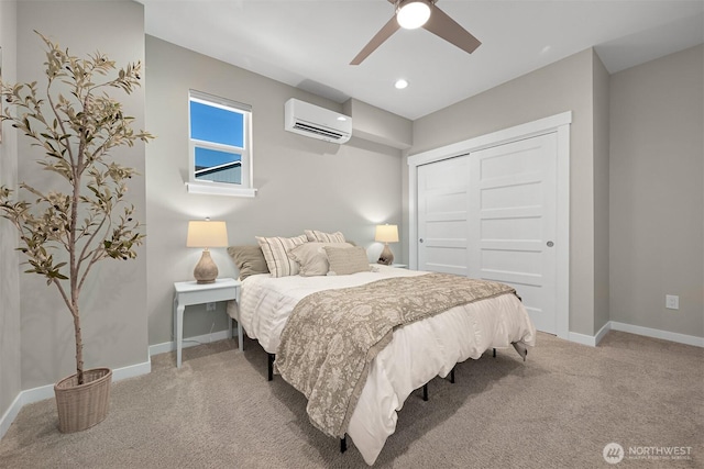 5690 Sunstone Pl Unit 101, Ferndale, WA 98248 - carpeted bedroom featuring a wall unit AC, a closet, a ceiling fan, and recessed lighting