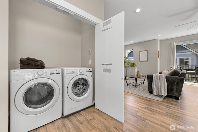 5690 Sunstone Pl Unit 101, Ferndale, WA 98248 - laundry room featuring washing machine and clothes dryer, light wood-style flooring, recessed lighting, and ceiling fan