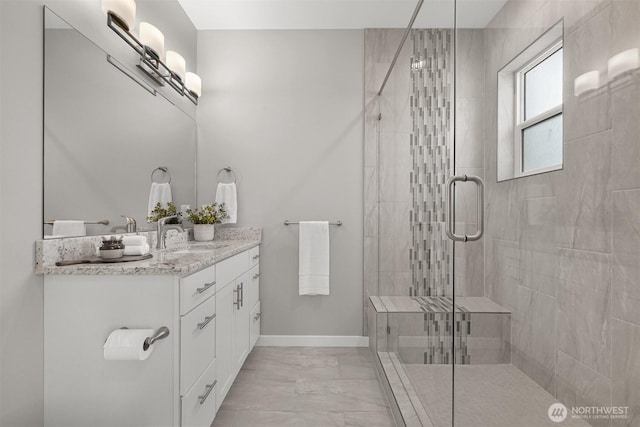 5690 Sunstone Pl Unit 101, Ferndale, WA 98248 - bathroom featuring vanity, a stall shower, and marble finish flooring