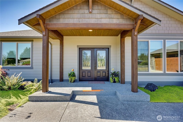73 Sable Ct, Sequim, WA 98382 - entrance to property featuring french doors and a shingled roof