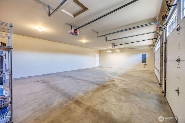 73 Sable Ct, Sequim, WA 98382 - garage with a garage door opener and electric panel