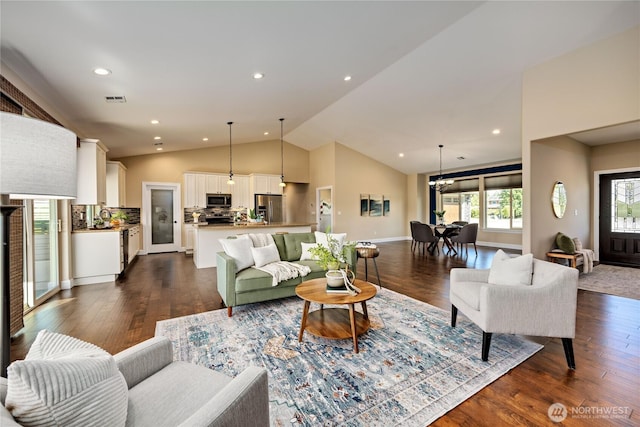 73 Sable Ct, Sequim, WA 98382 - living area featuring dark wood-style floors, recessed lighting, a chandelier, and high vaulted ceiling