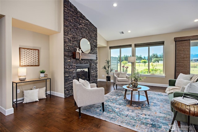 73 Sable Ct, Sequim, WA 98382 - living area featuring wood finished floors, a stone fireplace, recessed lighting, and high vaulted ceiling