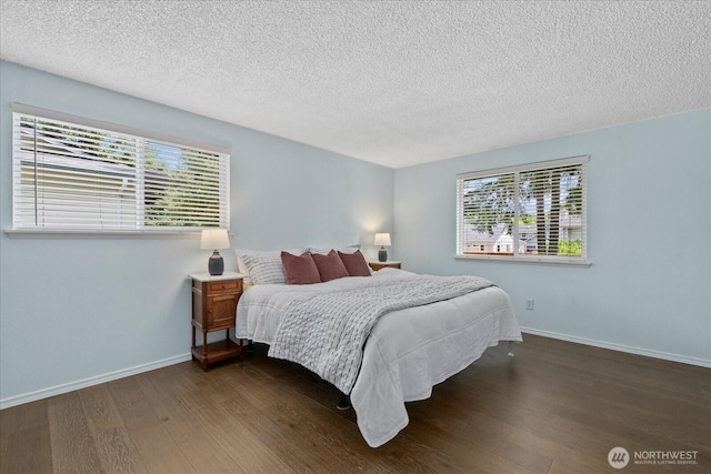 14416 4th Ave E, Tacoma, WA 98445 - bedroom with dark wood-type flooring and a textured ceiling