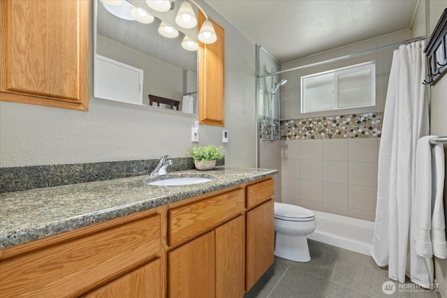 14416 4th Ave E, Tacoma, WA 98445 - bathroom featuring vanity, tile patterned floors, and tiled shower