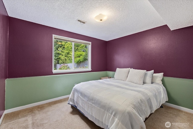 14416 4th Ave E, Tacoma, WA 98445 - carpeted bedroom with a textured ceiling and baseboards