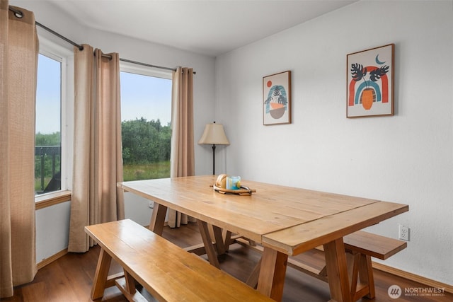 853 Ocean Shores Blvd NW Unit 4, Ocean Shores, WA 98569 - dining space with plenty of natural light and wood finished floors