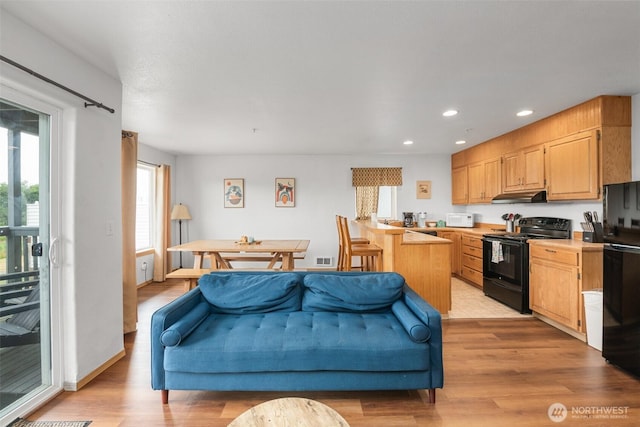 853 Ocean Shores Blvd NW Unit 4, Ocean Shores, WA 98569 - living area with light wood-type flooring and recessed lighting
