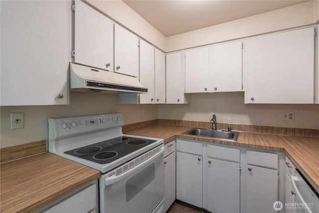230 SW Clark St Unit C203, Issaquah, WA 98207 - kitchen featuring white range with electric cooktop, under cabinet range hood, white cabinetry, and light countertops