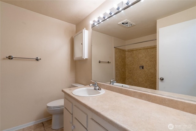 230 SW Clark St Unit C203, Issaquah, WA 98207 - full bathroom featuring vanity, a shower, and tile patterned flooring