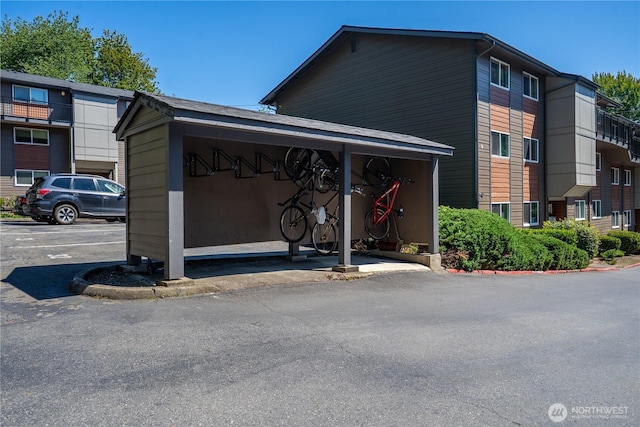 230 SW Clark St Unit C203, Issaquah, WA 98207 - view of building exterior with uncovered parking
