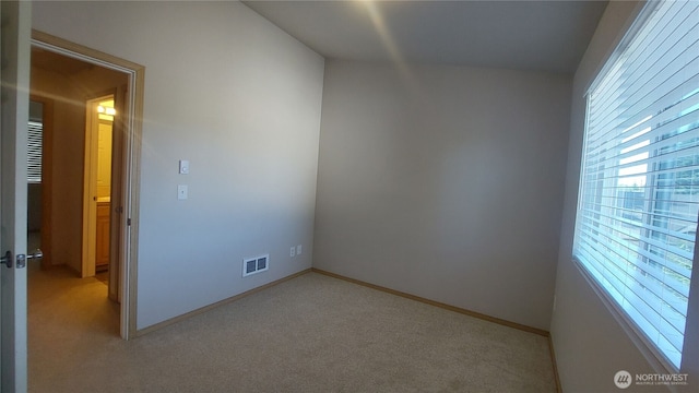6907 Rainier Dr E Unit 1B, Everett, WA 98203 - spare room with light colored carpet