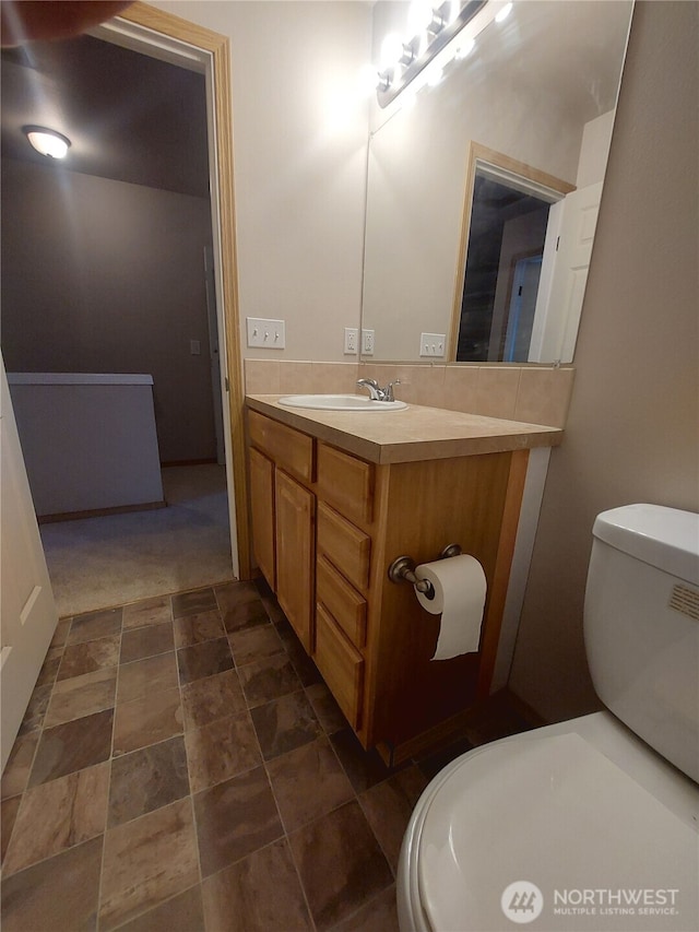 6907 Rainier Dr E Unit 1B, Everett, WA 98203 - bathroom with vanity and stone finish floors