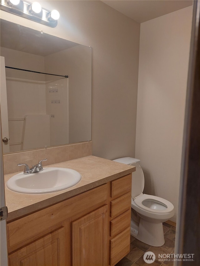 6907 Rainier Dr E Unit 1B, Everett, WA 98203 - bathroom with vanity, a shower, and tile patterned flooring