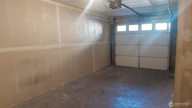 6907 Rainier Dr E Unit 1B, Everett, WA 98203 - garage with a garage door opener