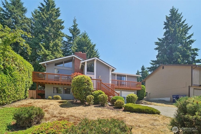 32710 5th Ave SW, Federal Way, WA 98023 - view of front of house featuring concrete driveway, a deck, and stairs