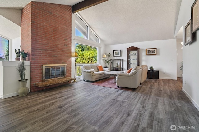32710 5th Ave SW, Federal Way, WA 98023 - living area with a textured ceiling, a brick fireplace, wood finished floors, high vaulted ceiling, and beamed ceiling