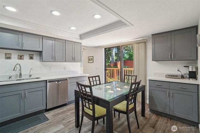 32710 5th Ave SW, Federal Way, WA 98023 - kitchen with stainless steel dishwasher, gray cabinets, wood finished floors, light countertops, and recessed lighting