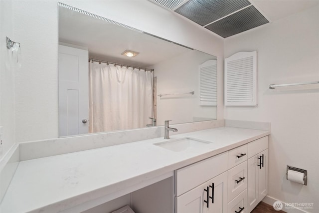 32710 5th Ave SW, Federal Way, WA 98023 - bathroom with vanity and a shower with shower curtain