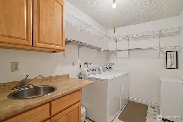 32710 5th Ave SW, Federal Way, WA 98023 - laundry area with washing machine and clothes dryer, cabinet space, and a textured ceiling