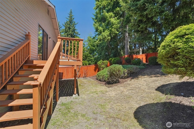 32710 5th Ave SW, Federal Way, WA 98023 - fenced backyard with stairway and a wooden deck
